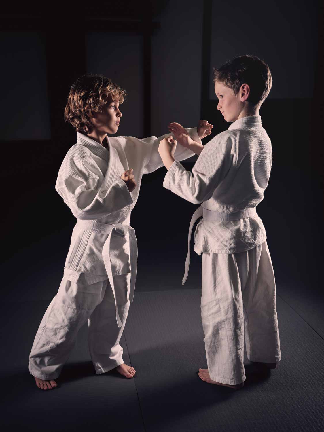 A smiling young karateka